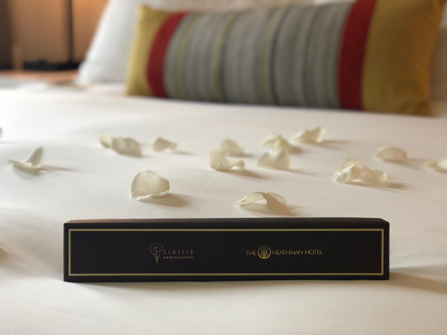 Rose Petals and Room Amenity on Heathman Bed